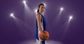 Composition of caucasian male basketball player holding ball with spot lights and copy space