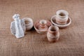 Composition of ceramic goods on sackcloth background