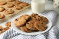 Composition chip cookies and milk on white table Royalty Free Stock Photo
