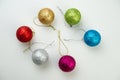 composition of Christmas colorful balls lie on a light background.