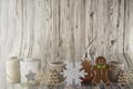 Composition of Christmas ornaments with bulb cup, cardboard cup and gingerbread cookies. Wooden background design with