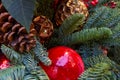 Composition of Christmas toys and cones and branches of spruce. Close-up Royalty Free Stock Photo