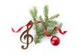 Composition with Christmas tree branch, decor and wooden music note on white background Royalty Free Stock Photo