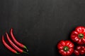 Composition of cilly peppers and sweet peppers. Concept of autumn vegetables Royalty Free Stock Photo