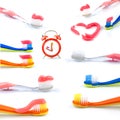Composition from clock, color toothbrushes with toothpaste, set Royalty Free Stock Photo