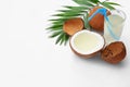 Composition with coconuts and drink on white Royalty Free Stock Photo