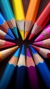 Composition of color pencils harmony in hues, textured backdrop