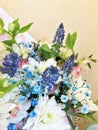 Composition with Colorful flowers. Flowers blue muskari, white chrysanthemum, alstroemeria and blue gypsophila. Flowers close up