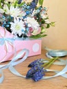 Composition with Colorful flowers. Flowers blue muskari, white chrysanthemum, alstroemeria and blue gypsophila. Flowers close up