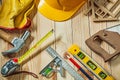 Composition of construction tools  on wooden background Royalty Free Stock Photo