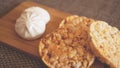 Composition with crunchy rice cakes on wooden background, side view - soft focus