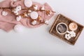 Composition with cup of coffee, burning candles and cotton flowers on white background