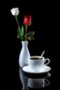 Composition with cup of coffee, white and red rose on a black re Royalty Free Stock Photo