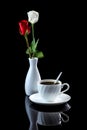 Composition with cup of coffee, white and red rose on a black re Royalty Free Stock Photo