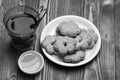 Composition of cup, honey and tiny gateau for tea time. Royalty Free Stock Photo