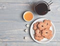 Composition of cup, honey and tiny gateau for tea time. Royalty Free Stock Photo