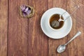 Cup of tea, tea accesories and dried leaves of orchids