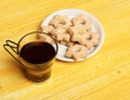 Composition of cup and tiny gateau for tea time Royalty Free Stock Photo