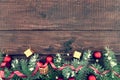 Composition with decorated Christmas tree on dark rustic wooden Royalty Free Stock Photo