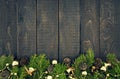 Composition with decorated Christmas tree on dark rustic wooden