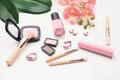 Composition with decorative cosmetics and makeup brushes on white background Royalty Free Stock Photo