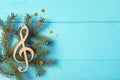 Composition with decorative treble clef and space for text. Christmas music concept Royalty Free Stock Photo