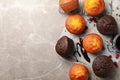 Composition with delicious muffins berries, chocolate and baking paper Royalty Free Stock Photo