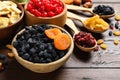 Composition with different dried fruits on wooden background Royalty Free Stock Photo