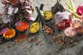 Composition with different spices on grey textured background Royalty Free Stock Photo