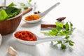 Composition with different spices and herbs on white wooden background Royalty Free Stock Photo