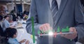 Composition of digital statistics over businessman using tablet in office