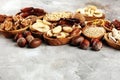 Composition with dried fruits and assorted healthy nuts in wooden bowls Royalty Free Stock Photo