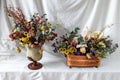 composition of dry flowers in a vase, white fabric background, still life Royalty Free Stock Photo