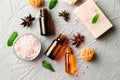 Composition with essential oils and soap on textured background, top view Royalty Free Stock Photo