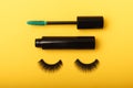 Composition with eyelash brush, eyelash curler, mascara and false eyelashes on background Royalty Free Stock Photo