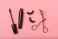 Composition with false eyelashes, mascara and eyelash brushes, eyelash curlers on background. Royalty Free Stock Photo