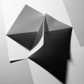 Composition featuring folded paper forms creating triangular Royalty Free Stock Photo