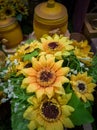 Composition of flowers and ceramics. A bouquet of bright yellow sunflowers Royalty Free Stock Photo