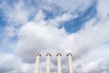 Composition of four ionic column with cloudy sky in the background / copy space / pillar /architecture / minimal style Royalty Free Stock Photo