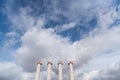 Composition of four ionic column with cloudy sky in the background / copy space / pillar /architecture / minimal style Royalty Free Stock Photo