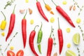 Composition with fresh chili peppers and herbs on white background Royalty Free Stock Photo