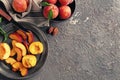 Composition with fresh peaches on grunge table Royalty Free Stock Photo