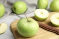 Composition with fresh ripe green apples on grey table Royalty Free Stock Photo