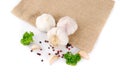 Composition of garlic and pasley on sacking, close up Royalty Free Stock Photo