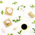 Composition with gentle roses, gifts, coffee mug and confetti on white background. Flat lay, top view. Valentines day