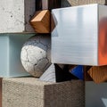 Composition of geometric shapes and textures featuring cubes a sphere and Royalty Free Stock Photo