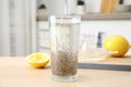 Composition with glass of water and chia seeds on table Royalty Free Stock Photo