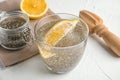 Composition with glass of water and chia seeds on white Royalty Free Stock Photo