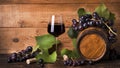 Still life, goblet of red wine, grapes and barrel Royalty Free Stock Photo