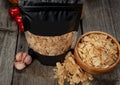 Composition with granulated dried garlic and flakes on wooden background